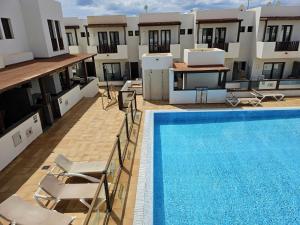 Duplex Noray vista a la piscina