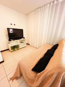 Apartamento amplo de frente para o mar em Resort