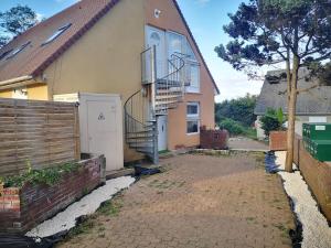Appartements n1 F2 40m2 avec petit jardin : photos des chambres