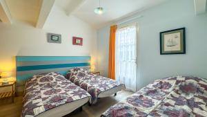 Villas Charmante location a proximite de la plage et des commerces : photos des chambres