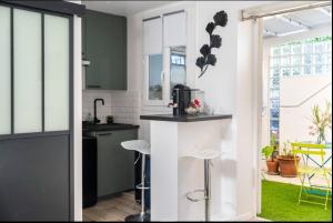 Appartements Studio 2 Joli studio neuf veranda d ete bords de Marne 5 km paris : photos des chambres