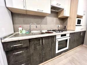 ApartPoltava Світла СТУДІЯ в НОВОМУ комфортному будинку, БІЛА АЛЬТАНКА Готельний чек