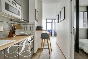 Cyrano, Appartement moderne 2 chambres Paris 14eme