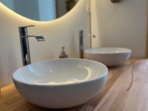 Appartements En plein coeur de Ste Mere Eglise : photos des chambres