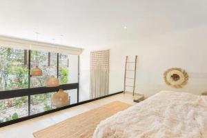 Laab Kay Tulum Loft in a tropical garden