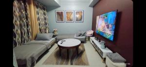 1BR with extra room at One Regis- Megaworld