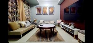 1BR with extra room at One Regis- Megaworld