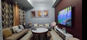 1BR with extra room at One Regis- Megaworld
