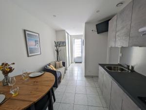 Appartements Pied-a-terre proche du centre et commodites : photos des chambres