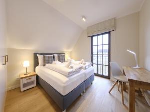 Reetland am Meer - Luxus Reetdachvilla mit 3 Schlafzimmern, Sauna und Kamin H07
