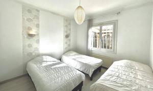 Villas Agreable villa avec piscine a 100 m de la plage - 10B14J35 : photos des chambres