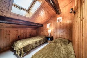 Appartements Appartement chalet - Le Vnipi : photos des chambres