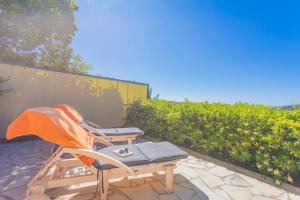 Appart Rez de jardin vue mer