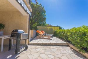 Appart Rez de jardin vue mer