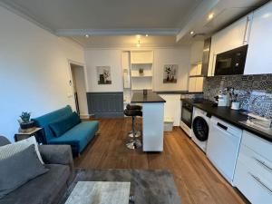 Appartements Appartement spacieux et moderne : photos des chambres