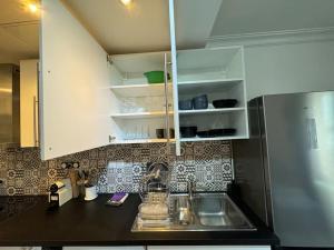 Appartements Appartement spacieux et moderne : photos des chambres