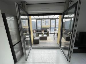 Appartements Elegant appartement, veranda cosy : photos des chambres