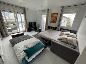 Appartements Elegant appartement, veranda cosy : photos des chambres