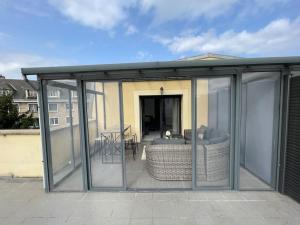 Appartements Elegant appartement, veranda cosy : photos des chambres