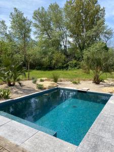 Maisons de vacances Le Nid - Chaleureuse maison avec piscine : photos des chambres
