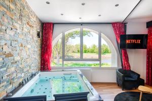 Appartements Love room au bord de l-eau. L-instant coquin : photos des chambres