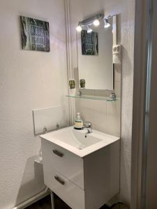 Appartements Cosy appartement centre ville parking Netflix : photos des chambres