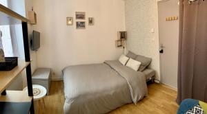 Appartements Cosy appartement centre ville parking Netflix : photos des chambres