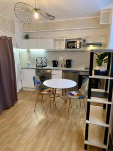 Appartements Cosy appartement centre ville parking Netflix : photos des chambres