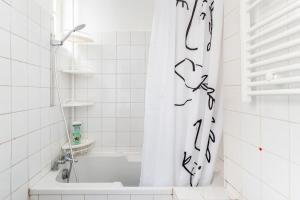 Appartements Le Grey Cocon - Studio cosy aux portes de Paris : photos des chambres