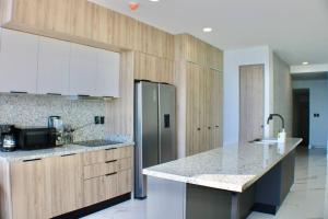 Brujas Tower- Hermoso departamento a pie de playa.