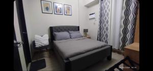 1BR with extra room at One Regis- Megaworld