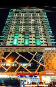 2BR Condo w free parking near SM North