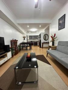 2BR Condo w free parking near SM North