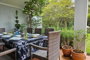 Pumbaa Farmhouse + Cottages