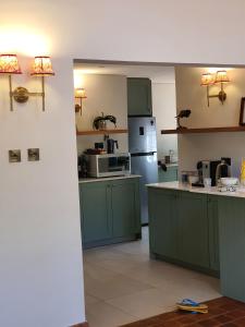 Pumbaa Farmhouse + Cottages