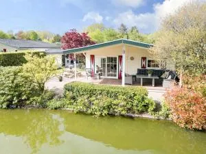 Prachtige vakantiewoning aan water met grote tuin - 福尔特赫伊曾