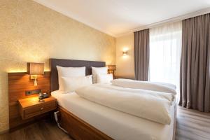 Standard double room in a traditional house room in Holzapfel