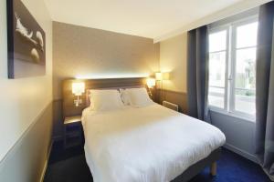 Hotels Hotel Poussin : photos des chambres