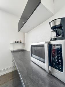 Appartements Le Bijou Bayeusain : photos des chambres