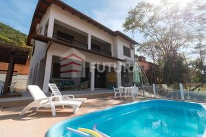 LINDA CASA COM PISCINA PARA ALUGUEL DE TEMPORADA EM BOMBAS