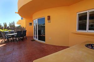 9A Poolside Private Patio Cerritos Beach Condo