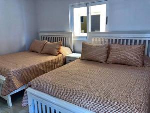 9A Poolside Private Patio Cerritos Beach Condo