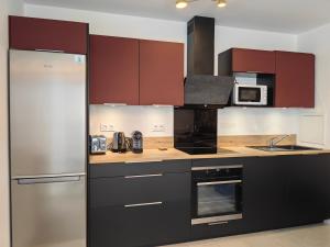 Appartements sacha's house ,a cote du RER,val d'europe,Paris-Disney . : photos des chambres