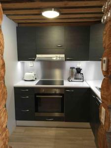 Keloparitalon loma-asunto Ylläs-näkymällä ja paljulla