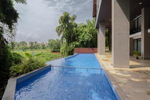 1BR Apt in Candolim with Pool, 5 mins from Beach