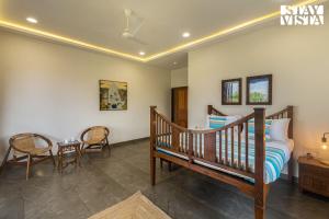 StayVistas Nyra Farms - Hill-view villa with Pool, Indoor & Outdoor games, & Lawn with Gazebo