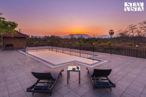 StayVistas Nyra Farms - Hill-view villa with Pool, Indoor & Outdoor games, & Lawn with Gazebo