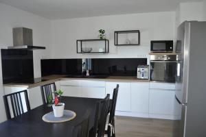 Appartements Spacieux appartement : photos des chambres
