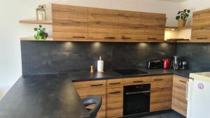 Appartements Le Berceau des Aiguilles - Vue montagne, terrasse - AravisTour : photos des chambres