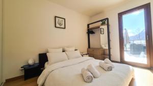Appartements Le Berceau des Aiguilles - Vue montagne, terrasse - AravisTour : photos des chambres
